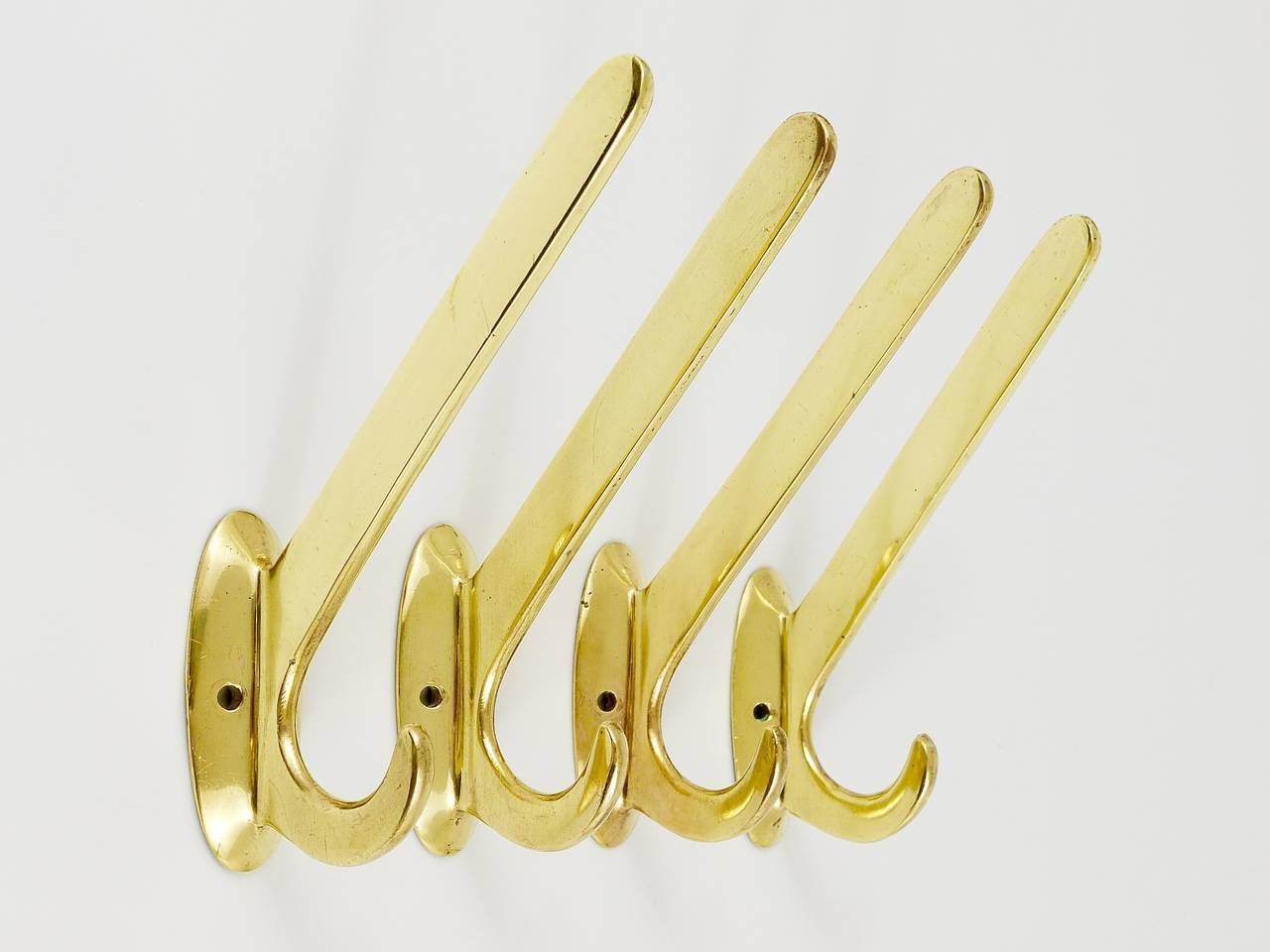 Four Art Nouveau Handmade Brass Wall Hooks, Austria, 1920s photo vintage