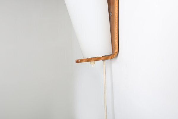 photo for sale Wall Lamp In Curved Teak Plywood By Louis Kalff For Philips, 1959