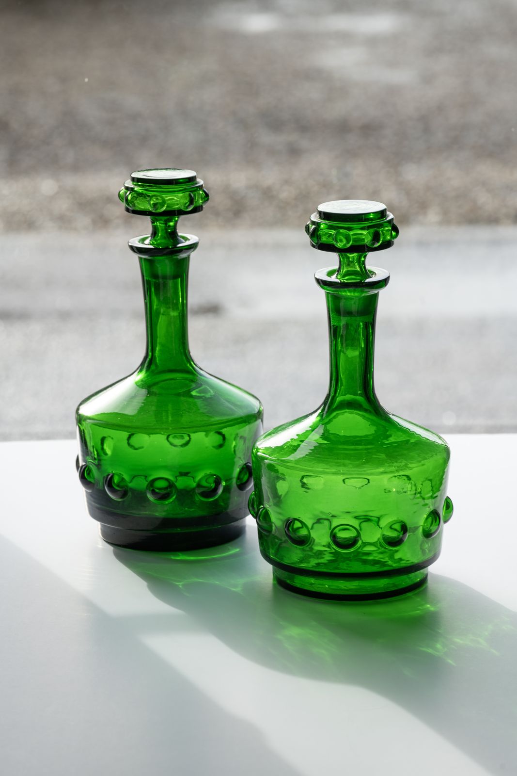 A Pair Of Emerald Glass Italian Mid Century Decanters