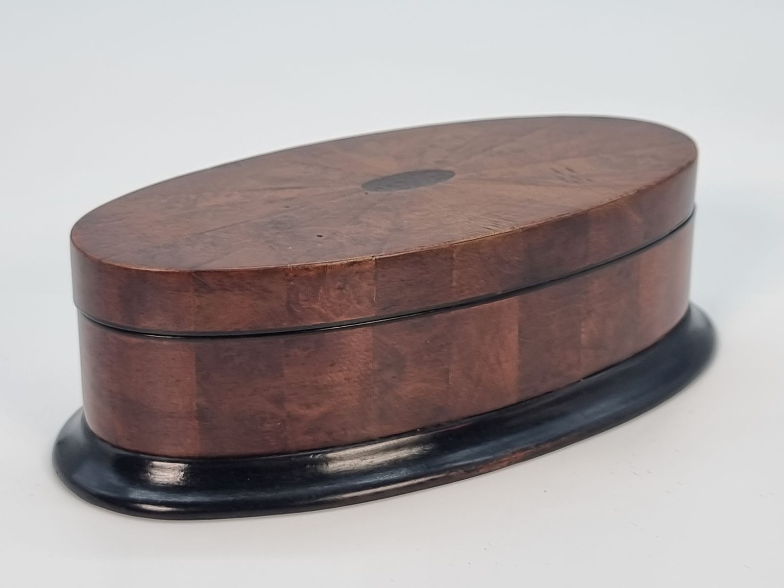 An Oval Box Veneered In Segments Of Burr Walnut, Circa 1910