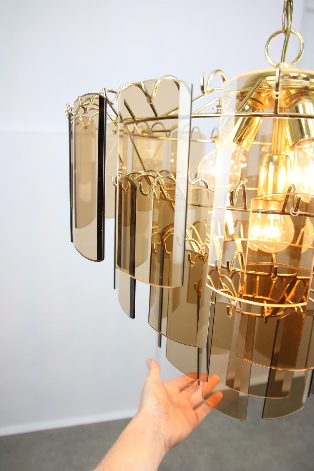 photo furniture Vintage Italian Veca Chandelier With 4 Levels / Italy 1970s / 48 Beveled Smoked Glass Discs And Brass Base / Mid Century Luxury Pendant Lamp