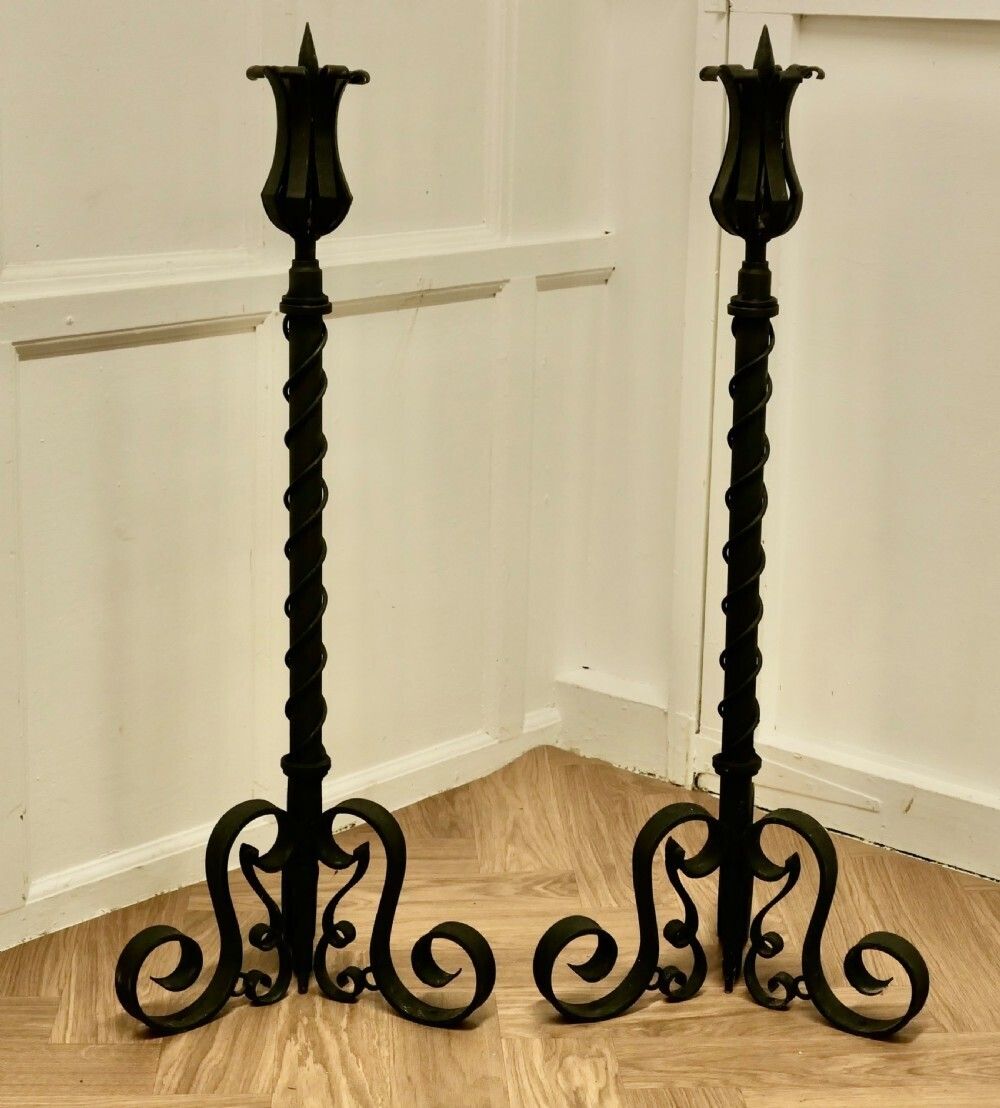 A Large Pair Of Wrought Iron Candle Sticks Or Torchère photo for sale