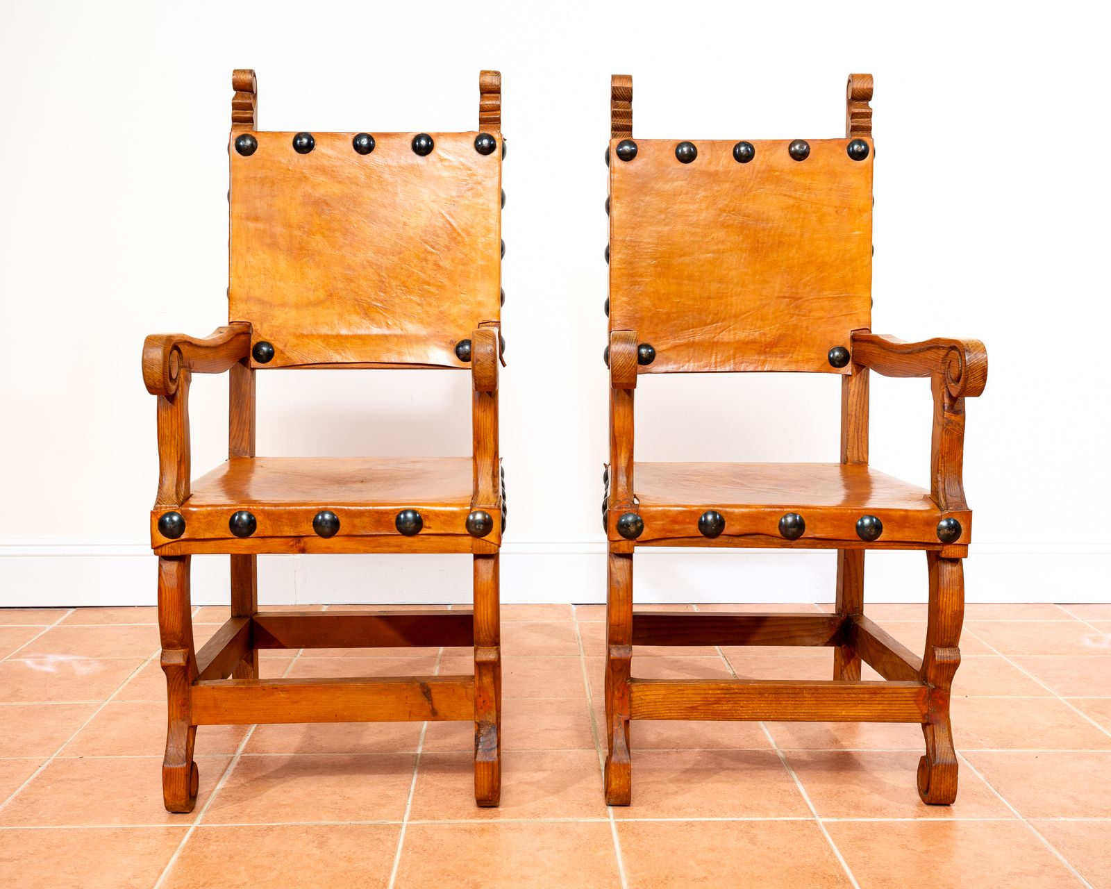 Pair Of Large Tan Leather Throne Chairs Spanish Colonial Baroque Style Mexican Studded Vintage Pine Hall Marriage Wedding Carver Dining Armchairs photo furniture