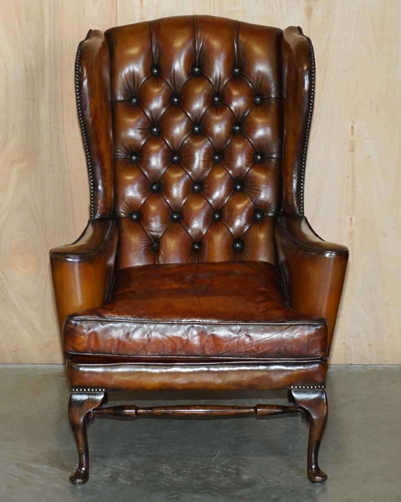 Pair Of William Morris Chesterfield Tufted Wingback Brown Leather Armchairs photo for sale