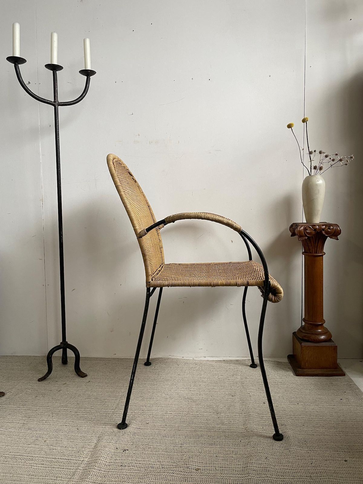 Vintage Iron Frame Carver Chair With Woven Rattan Cane Upholstery And Curved Legs photo for sale