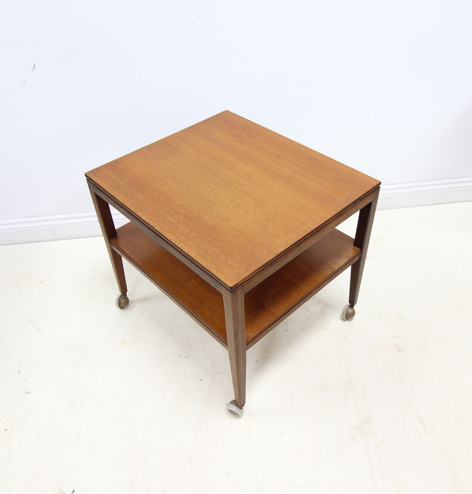 Mid Century Danish Style 2 Tier Teak Side Table On Castors photo buy