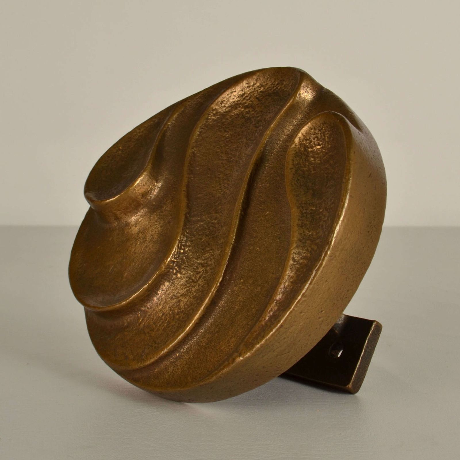 photo furniture Round Push And Pull Door Handle In Bronze With Curvaceous Relief