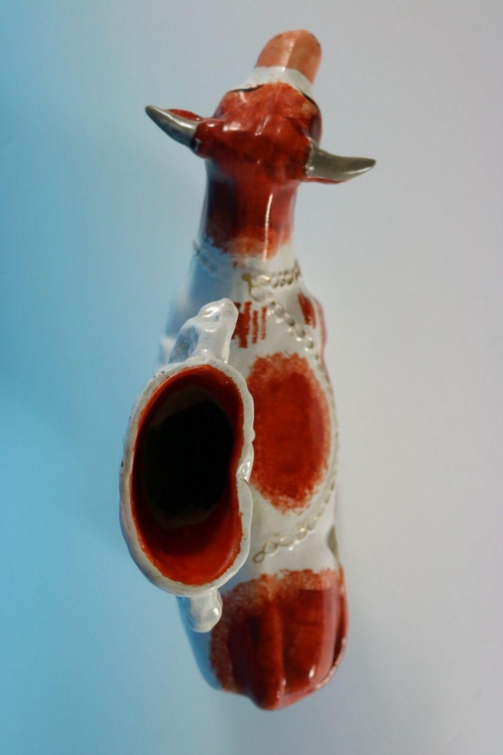 1986.0 Staffordshire Pottery 'Milk Sold Here' Cow Spill Vase photo