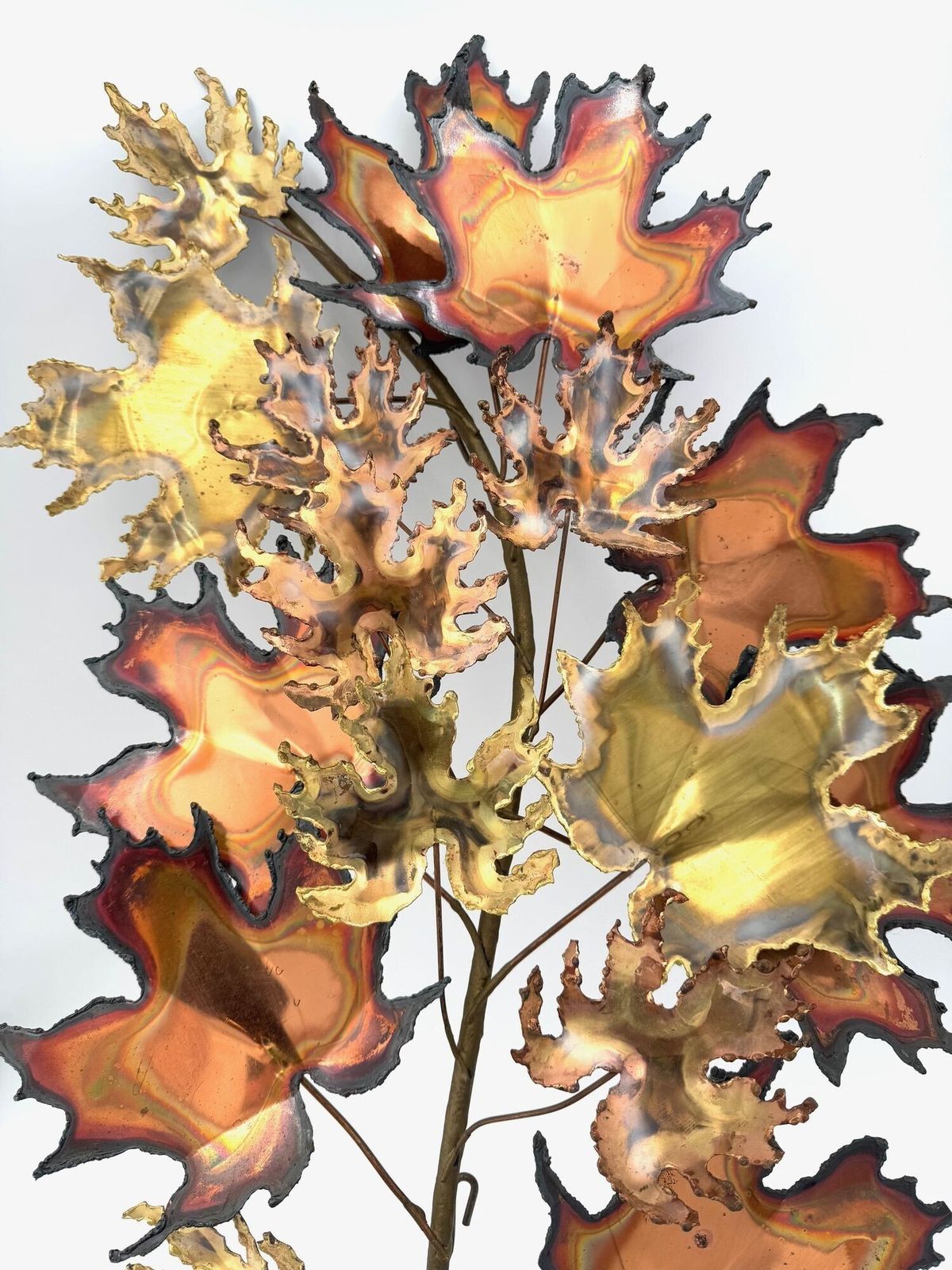 A Pair Of Large 1970s Curtis Jere Torch Cut Brass And Bronze Maple Leaf Sculptures photo for sale