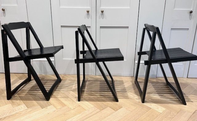 Vintage Black Folding Chairs. Striking Design Piece.
