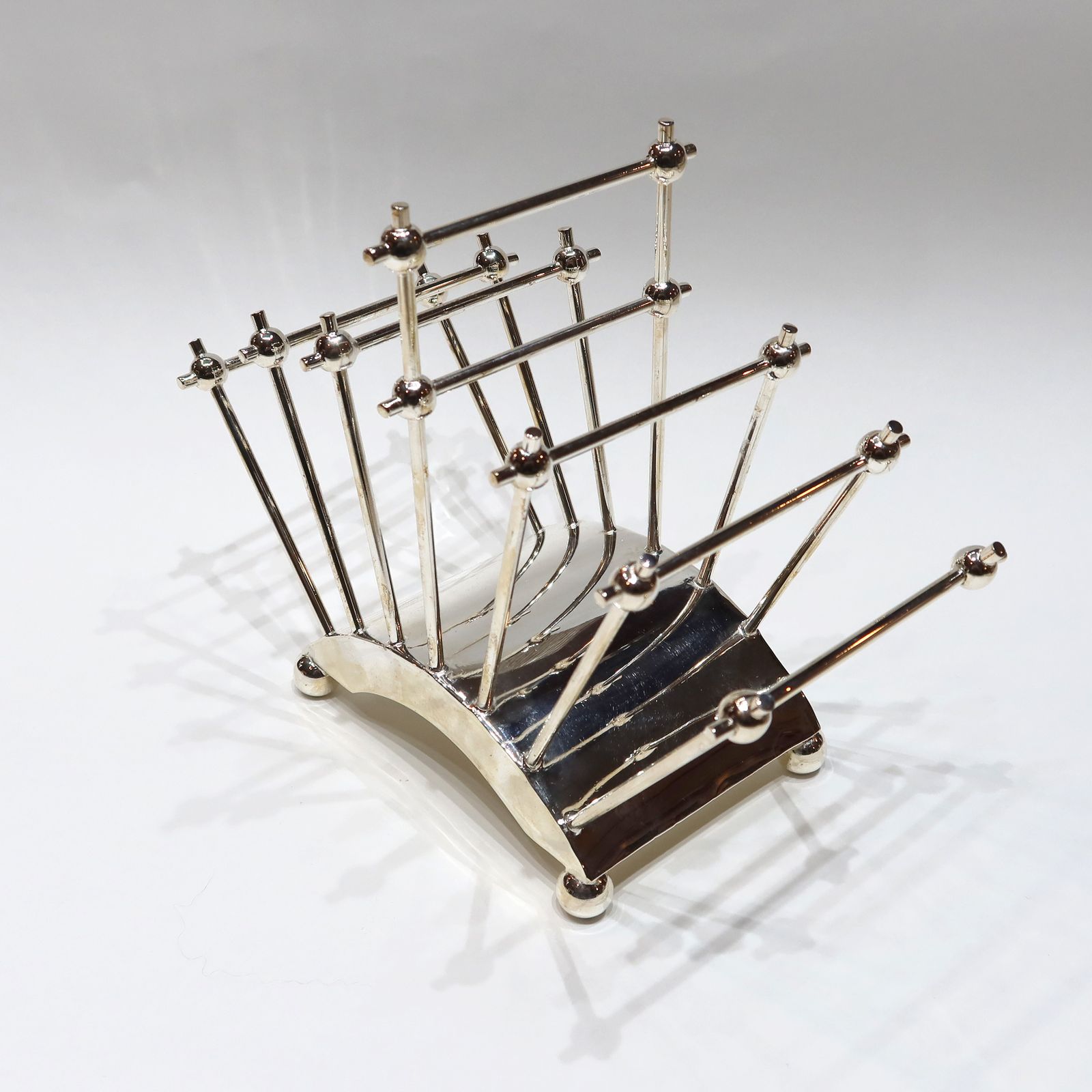 An Incredible And Rare, Silver Plated, Toast/Letter Rack Originally Designed By DR Christopher Dresser photo furniture