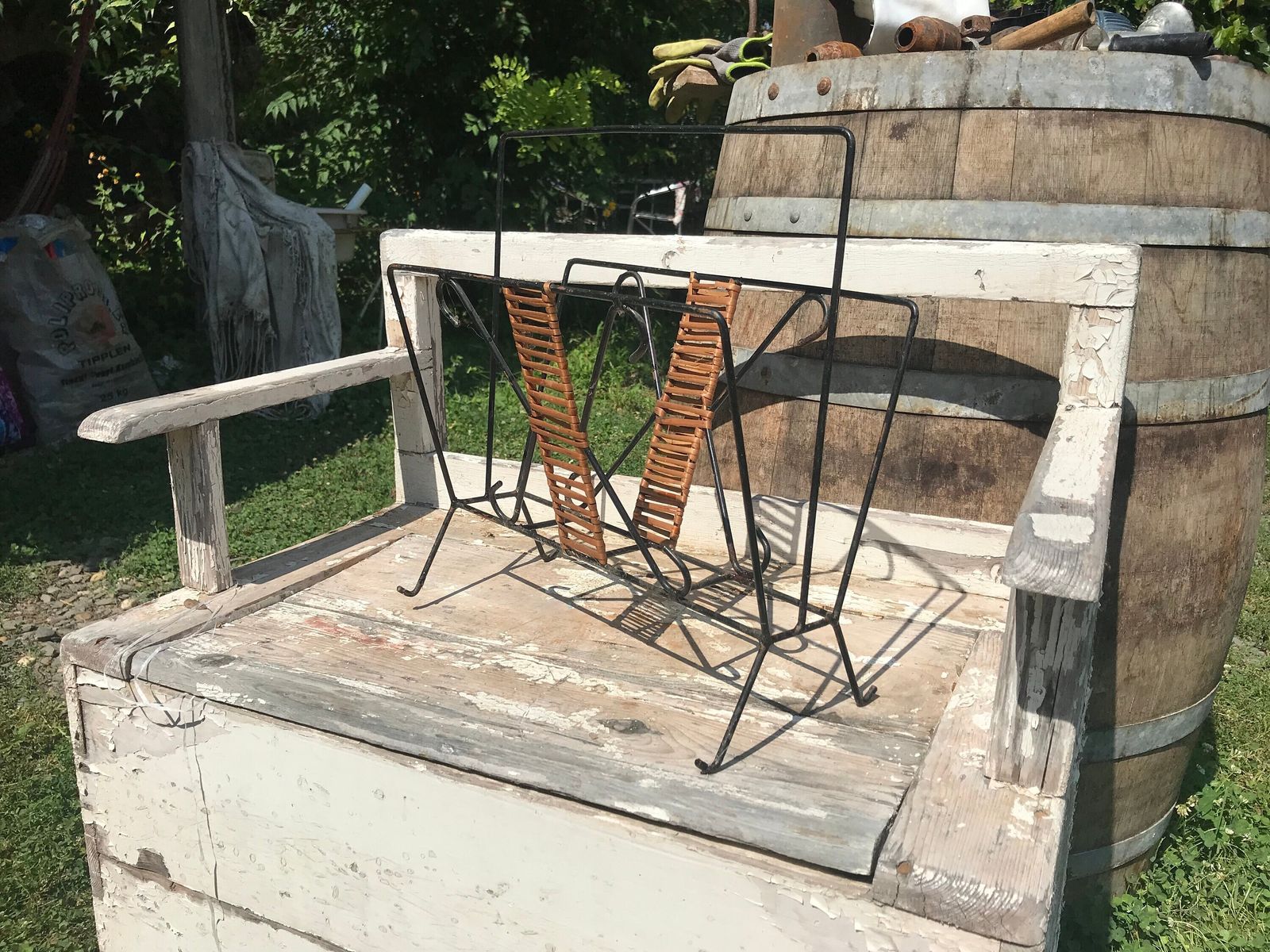 Metal Magazine Rack 1950s Black With Wicker Weave Newspaper Holder Bent Metal Display Stand, Eye Catching Cheerful And Unique Books Organise photo for sale