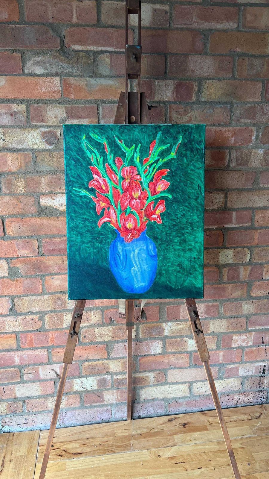 Contemporary Still Life Oil Painting – Red Gladiolus In Blue Vase photo furniture