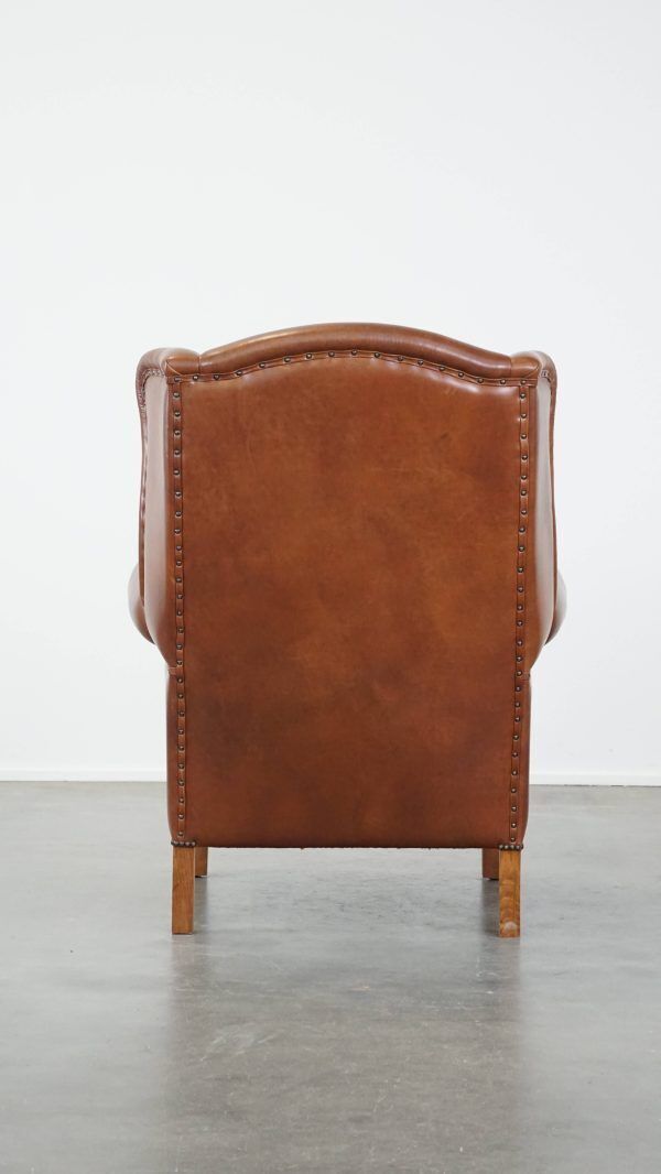 Large Cognac Colored Cowhide English Style Wing Chair In Good Condition photo Furniture