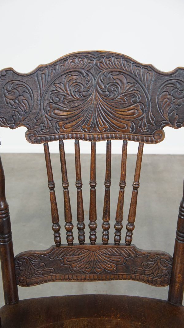 photo furniture Beautiful Antique English Spindle Chair With Beautiful Carvings And A Charming And Graceful Appearance