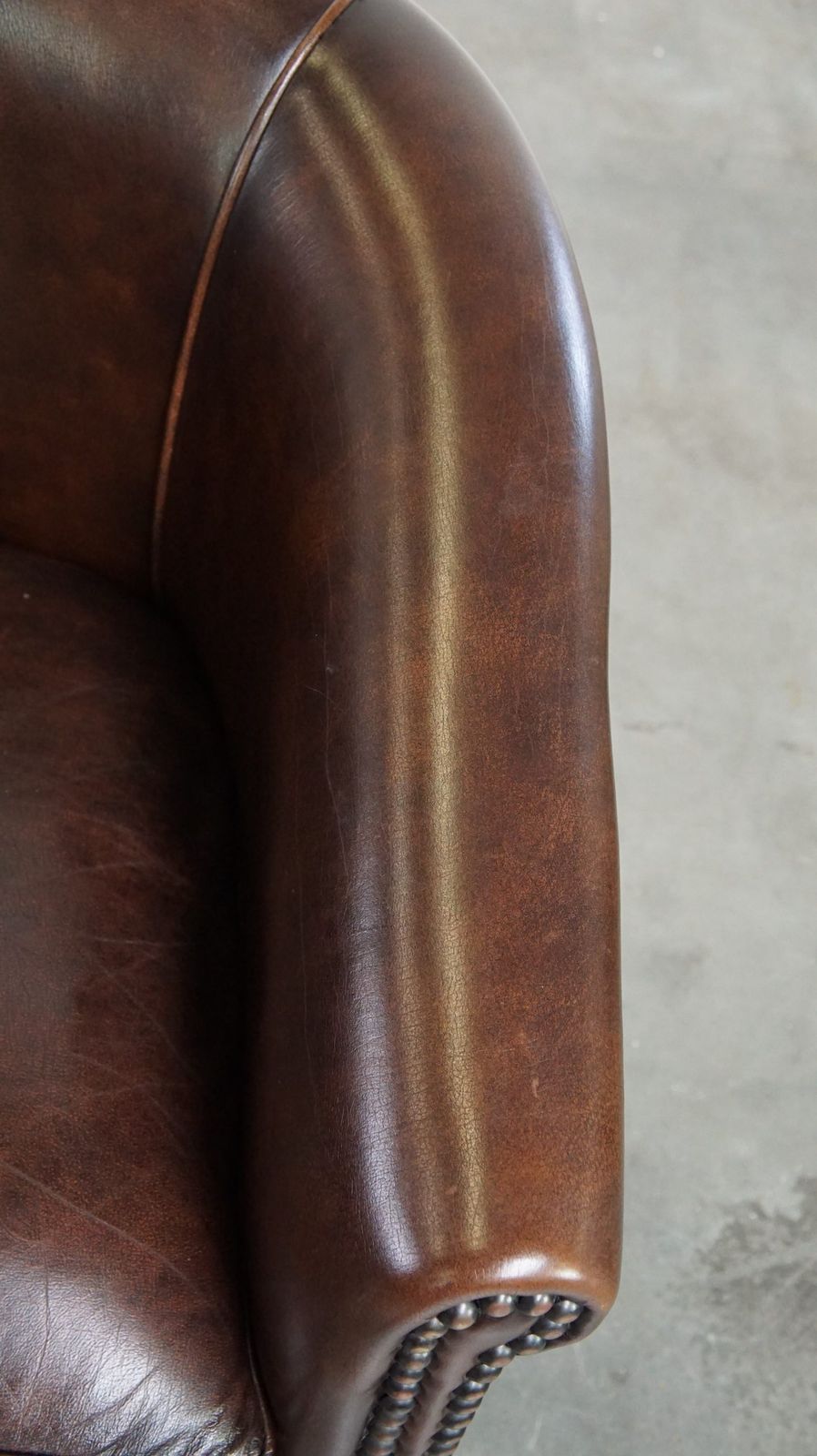 Beautiful Luxurious Dark Cowhide Club Chair With Ball Feet In English Style photo vintage