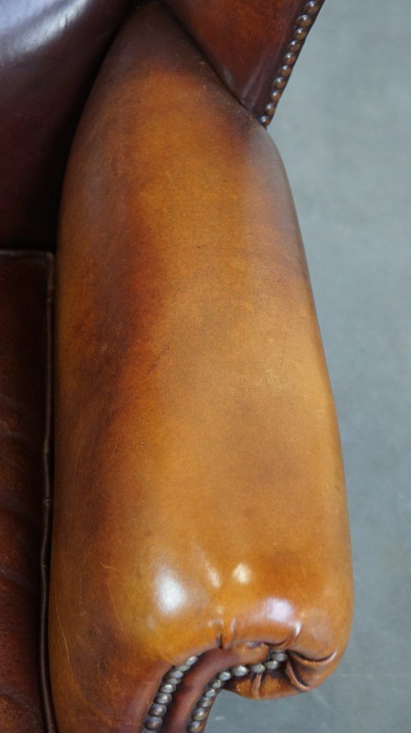 Comfortable, Elegant, Stately Wing Chair Made Of Sheepskin In A Beautiful Warm Color photo vintage