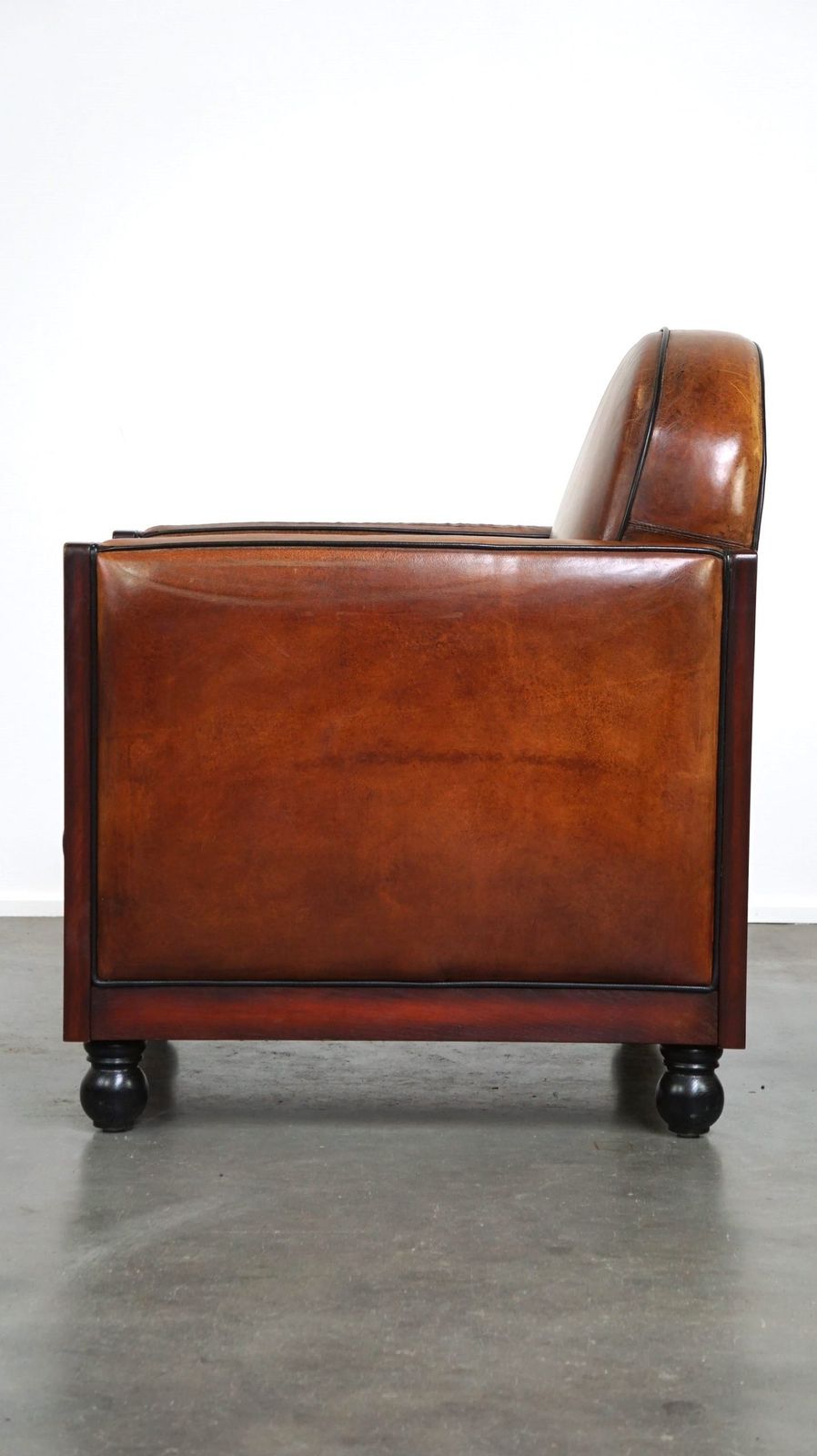 Sheepskin Art Deco Design Armchair Finished With Wood And Beautiful Cognac Colored Leather photo 1188.3800999999999