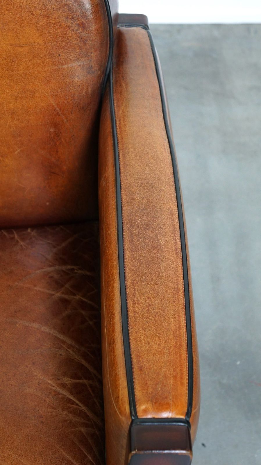 Sheepskin Art Deco Design Armchair Finished With Wood And Beautiful Cognac Colored Leather photo vintage