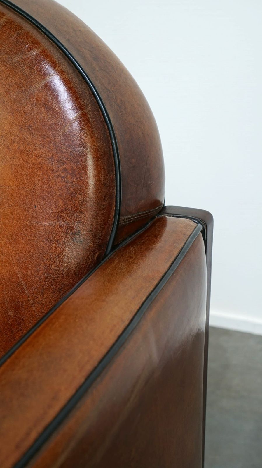 photo for sale Sheepskin Art Deco Design Armchair Finished With Wood And Beautiful Cognac Colored Leather