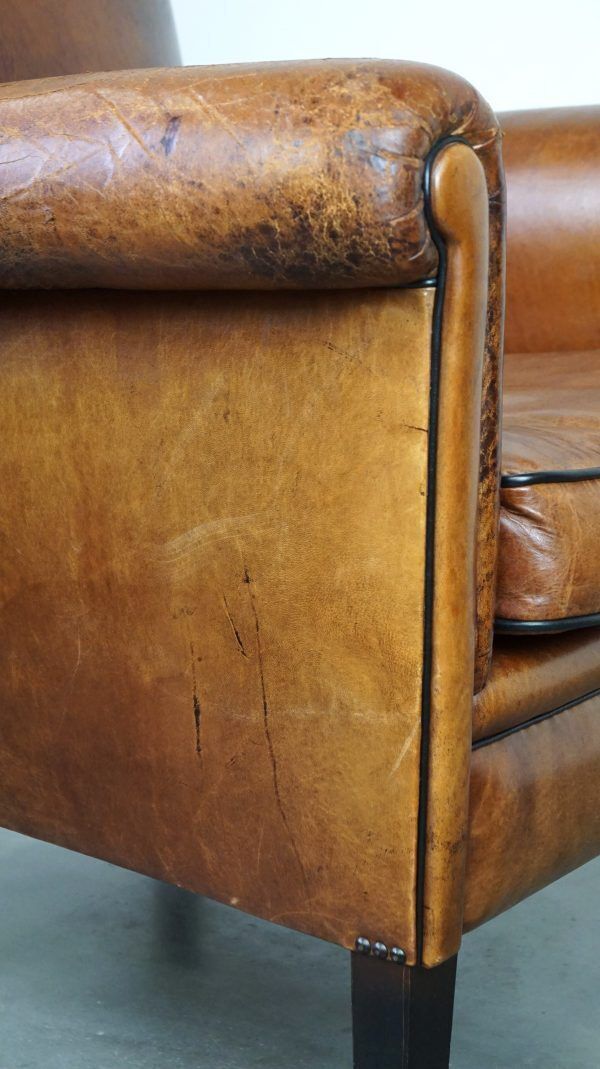 photo for sale Vintage Schapenleren Fauteuil – Stijlvol En Comfortabel