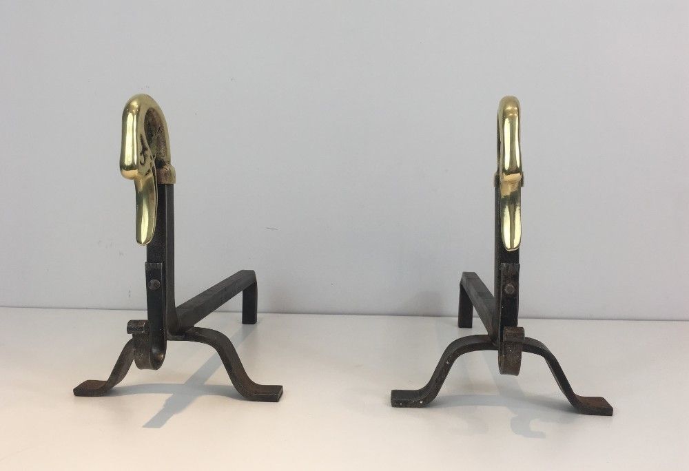 In The Style Of Maison Jansen. Pair Of Iron And Brass Andirons With Duck Heads. photo Home Fixtures