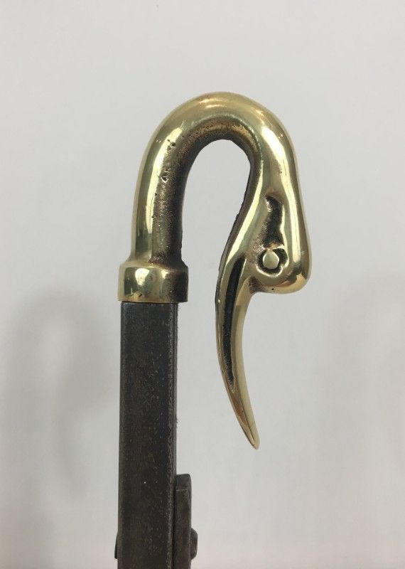 In The Style Of Maison Jansen. Pair Of Iron And Brass Andirons With Duck Heads. photo vintage