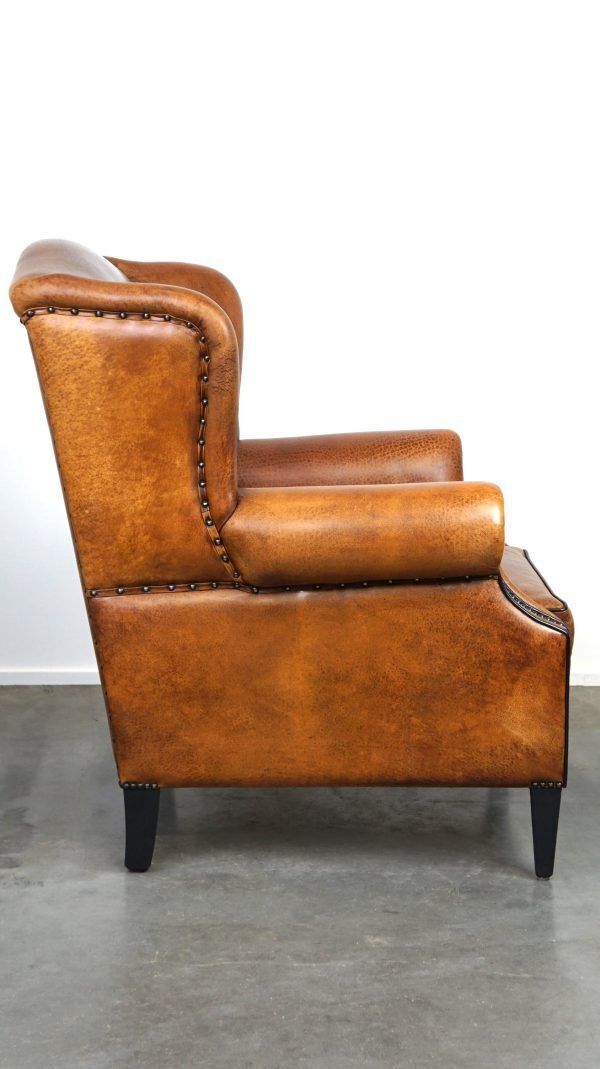 Beautiful Armchair Made Of Very Good Quality Sheepskin Finished With Nails And Black Piping photo 1383.3741