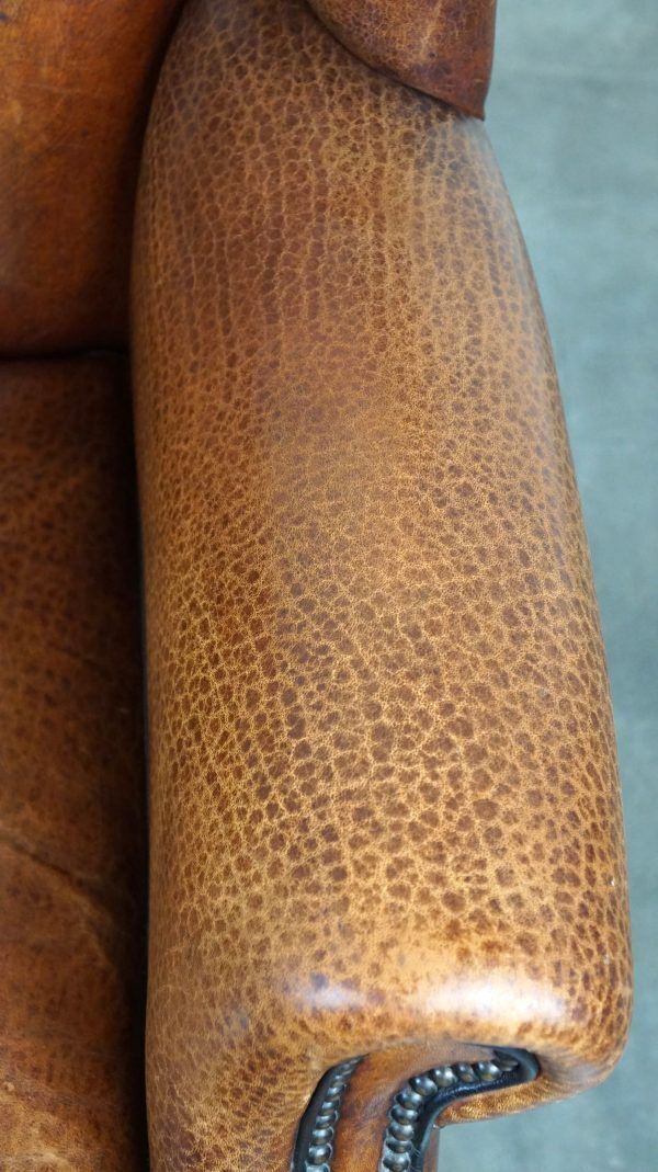 photo for sale Beautiful Armchair Made Of Very Good Quality Sheepskin Finished With Nails And Black Piping