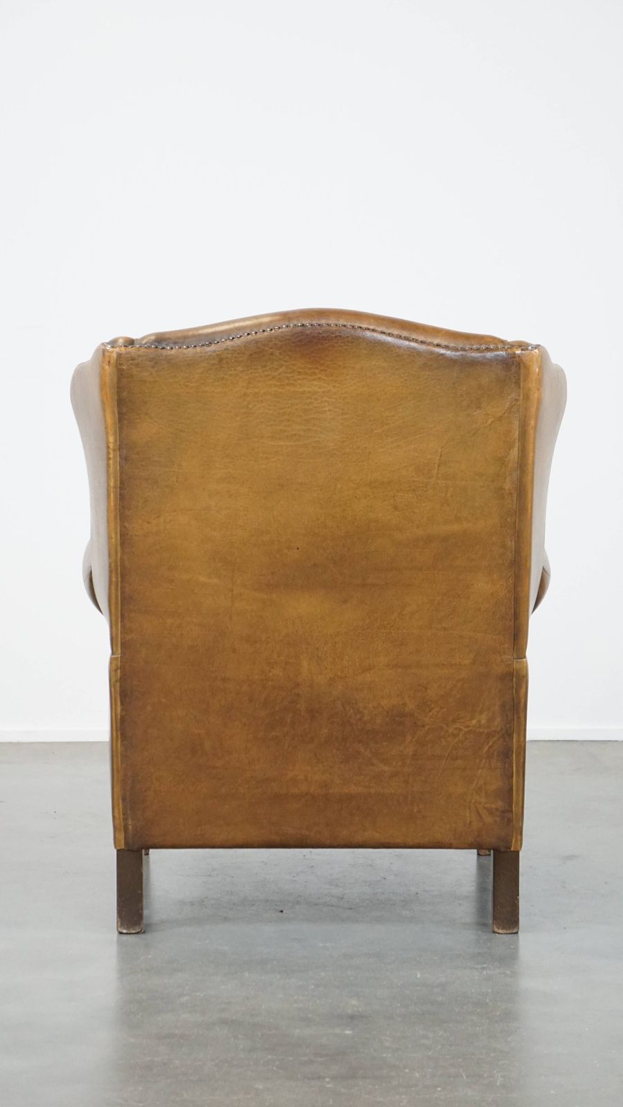Charming, Subtle English Style Sheepskin Wing Chair With Beautiful Colours And Excellent Seating Comfort photo Furniture