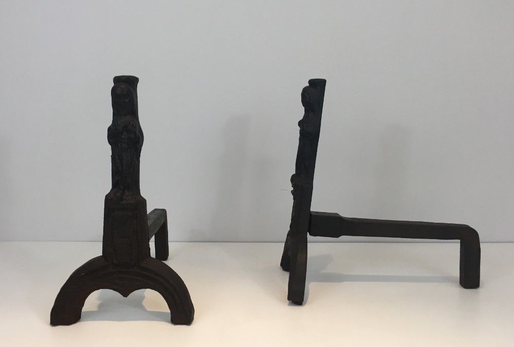 Pair Of Cast Iron Andirons Representing An Evangelist. photo Home Fixtures