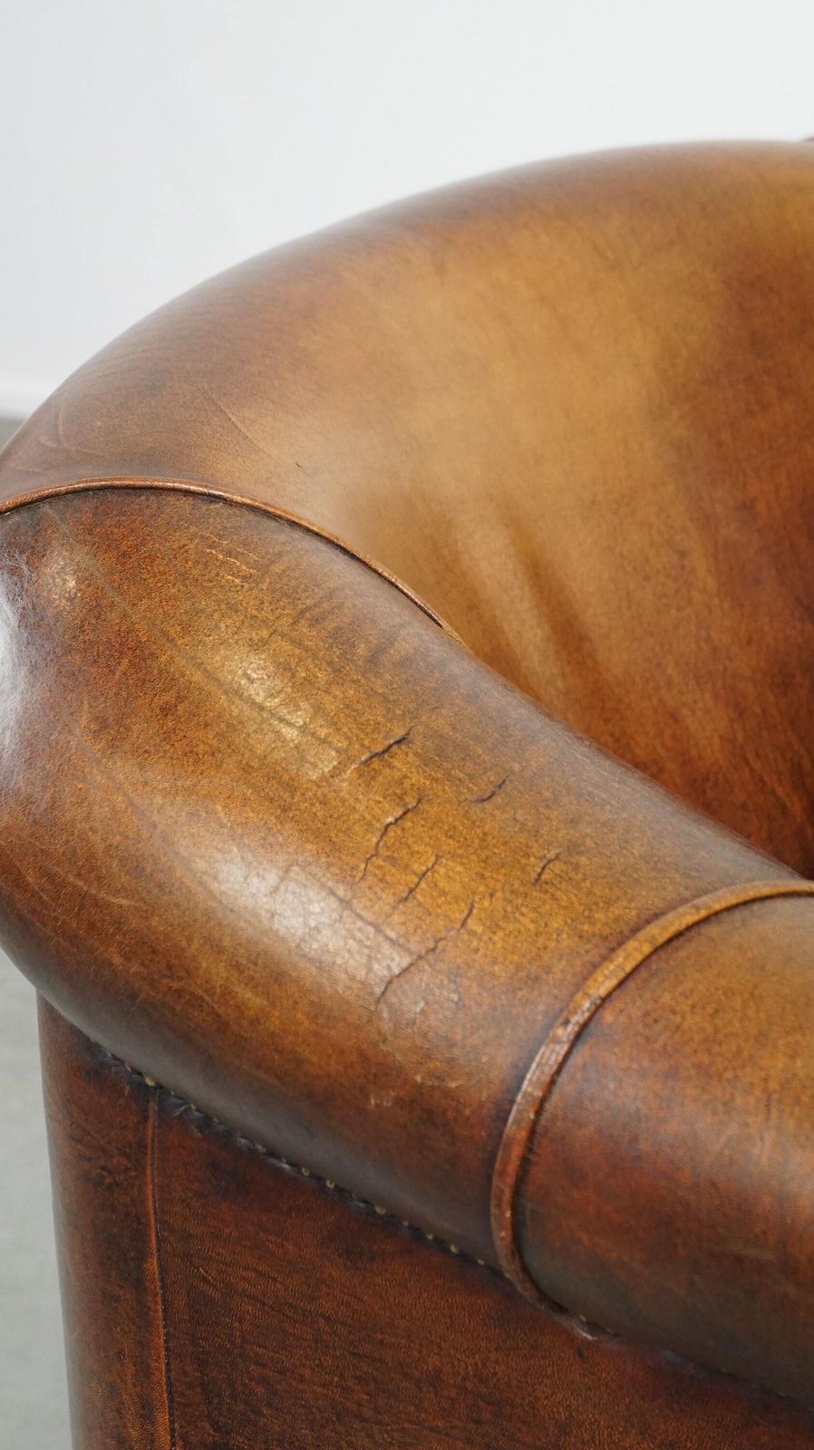 1043.2178999999999 Sheepskin Club Chair With Beautiful Colours And Correct Seating Comfort photo