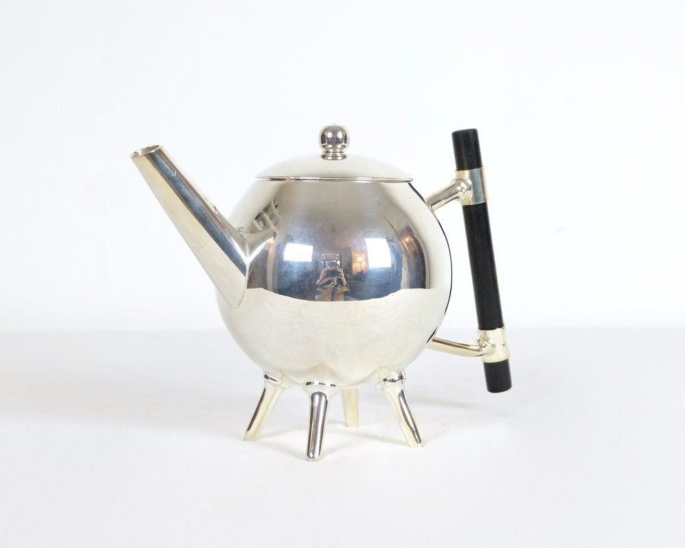 A Silver Art Deco Christopher Dresser Spherical Teapot photo furniture