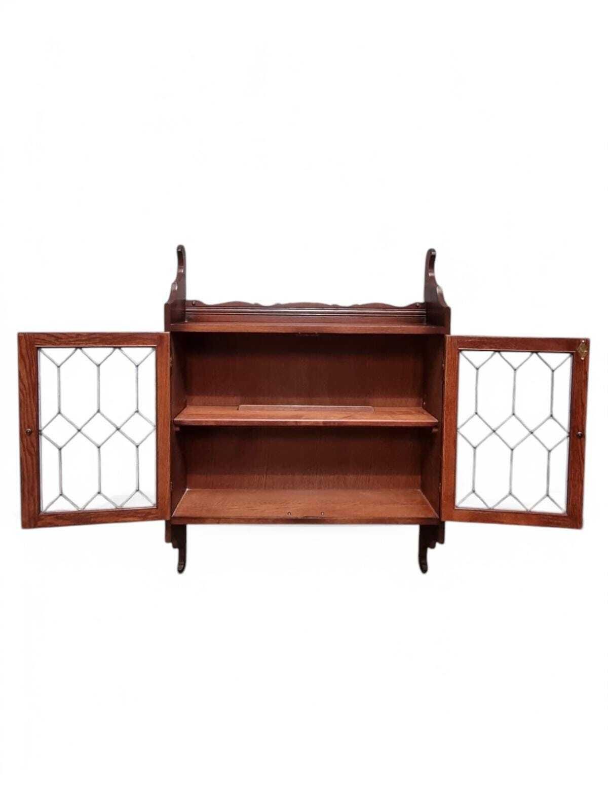 Old Charm Wood Brothers / Oak Hanging Corner Cabinet / Carved Oak Leaded Glass Door / Tudor Brown Colour / Dated 1970s photo for sale