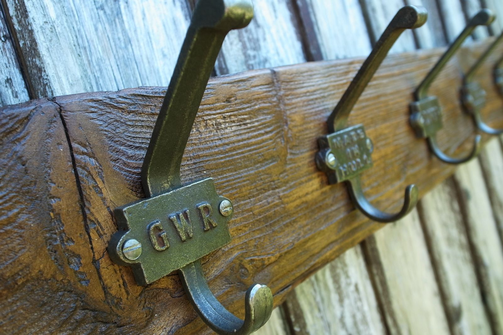 Reclaimed Wooden Coat Rack With Industrial Cast Iron Cloakroom Hooks photo vinterior