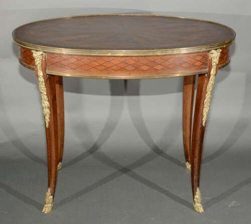 A 19th Century Gilt Bronze Mounted Louis XV Table On Hoof Feet
