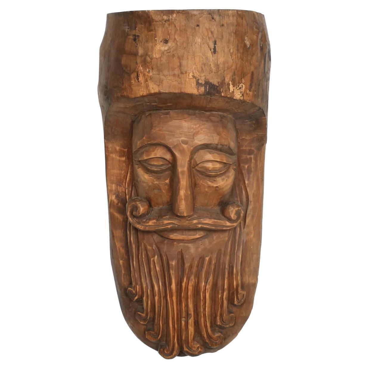 Hand Carved Rustic Wooden Mask With Soft Expression