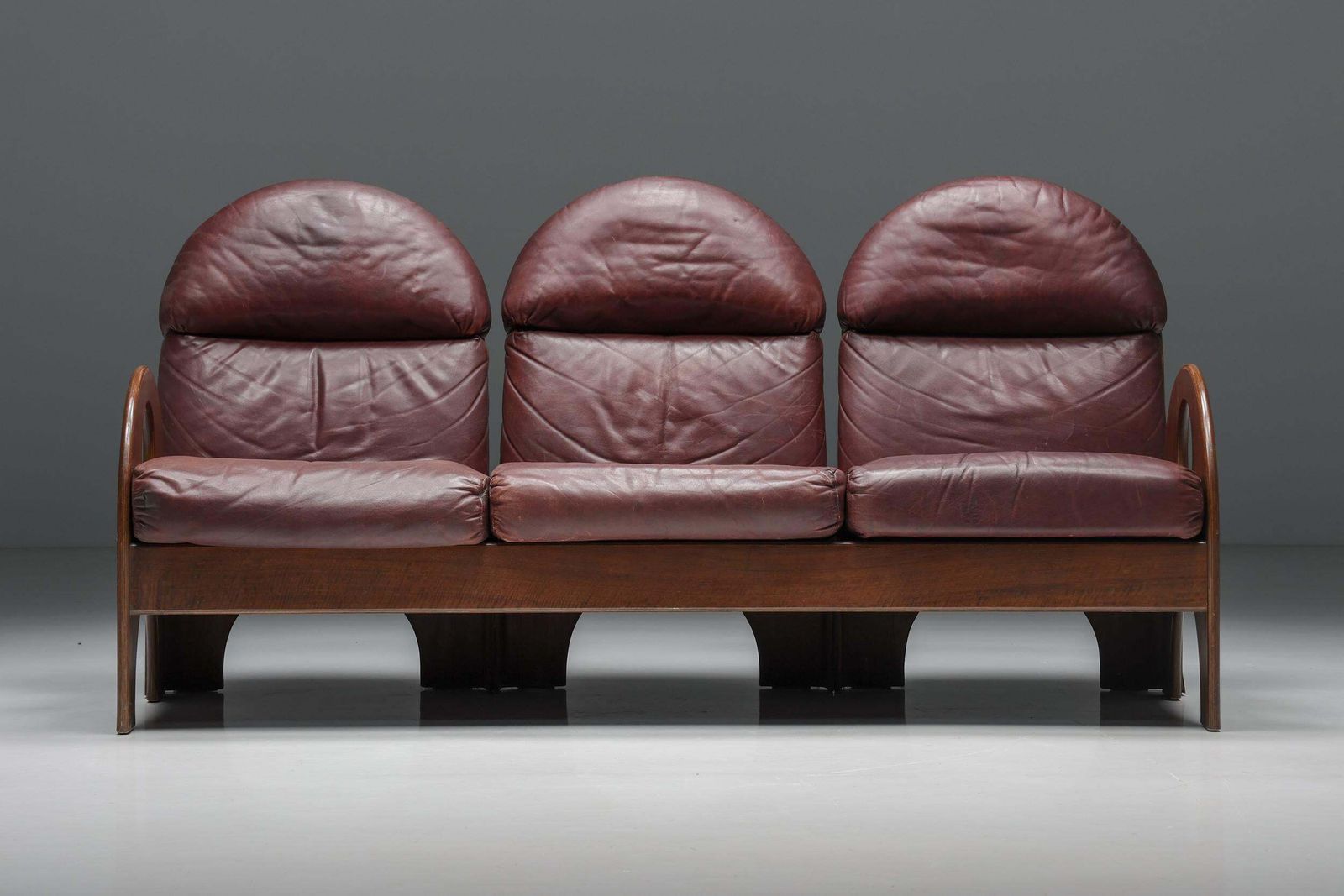 Three Seater 'Arcata' By Gae Aulenti, Walnut And Burgundy Leather, 1968 photo for sale