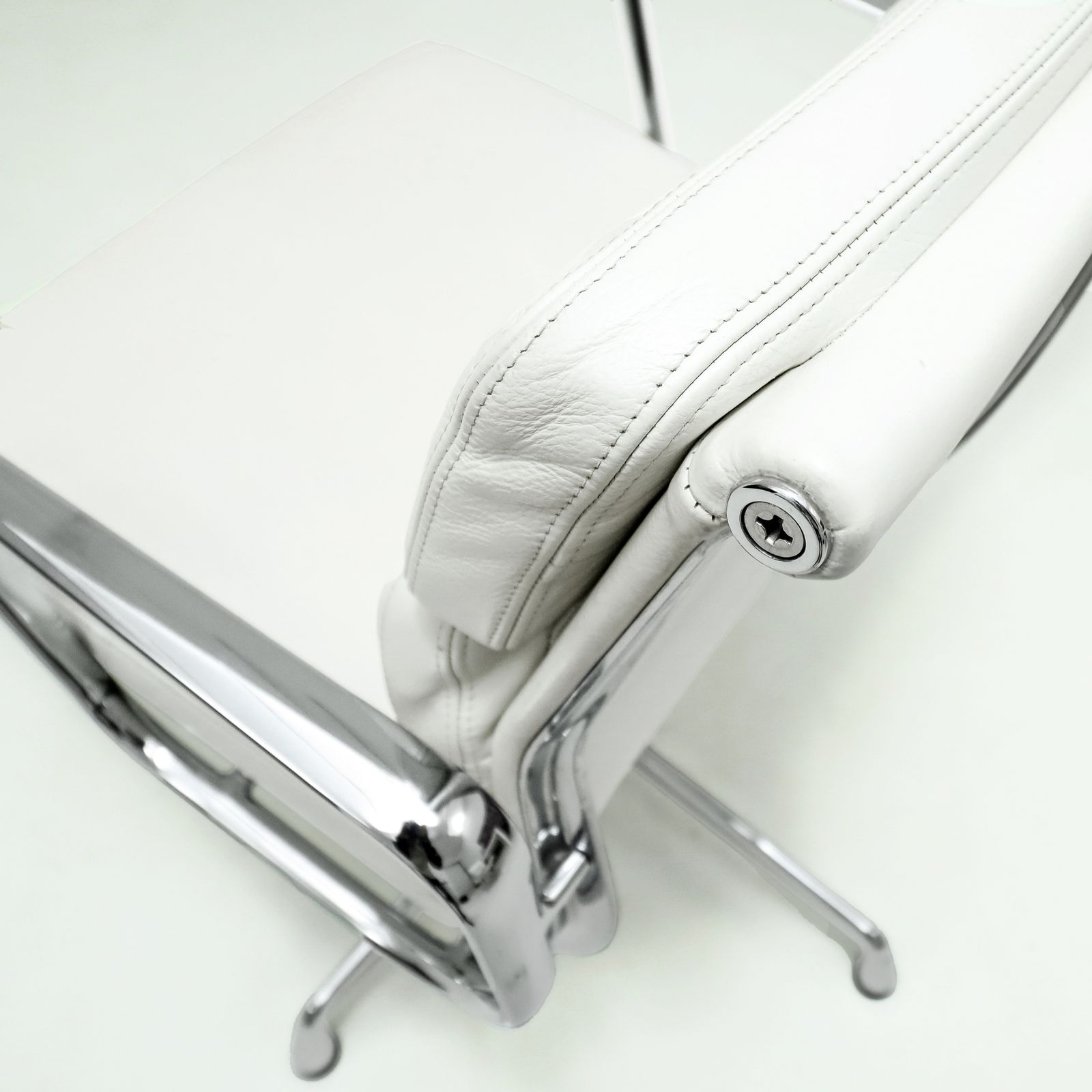 Original Vitra, Eames Ea208 Ivory Leather And Chrome Soft Pad Chairs With Revolving Bases   Two Available photo 1500.0