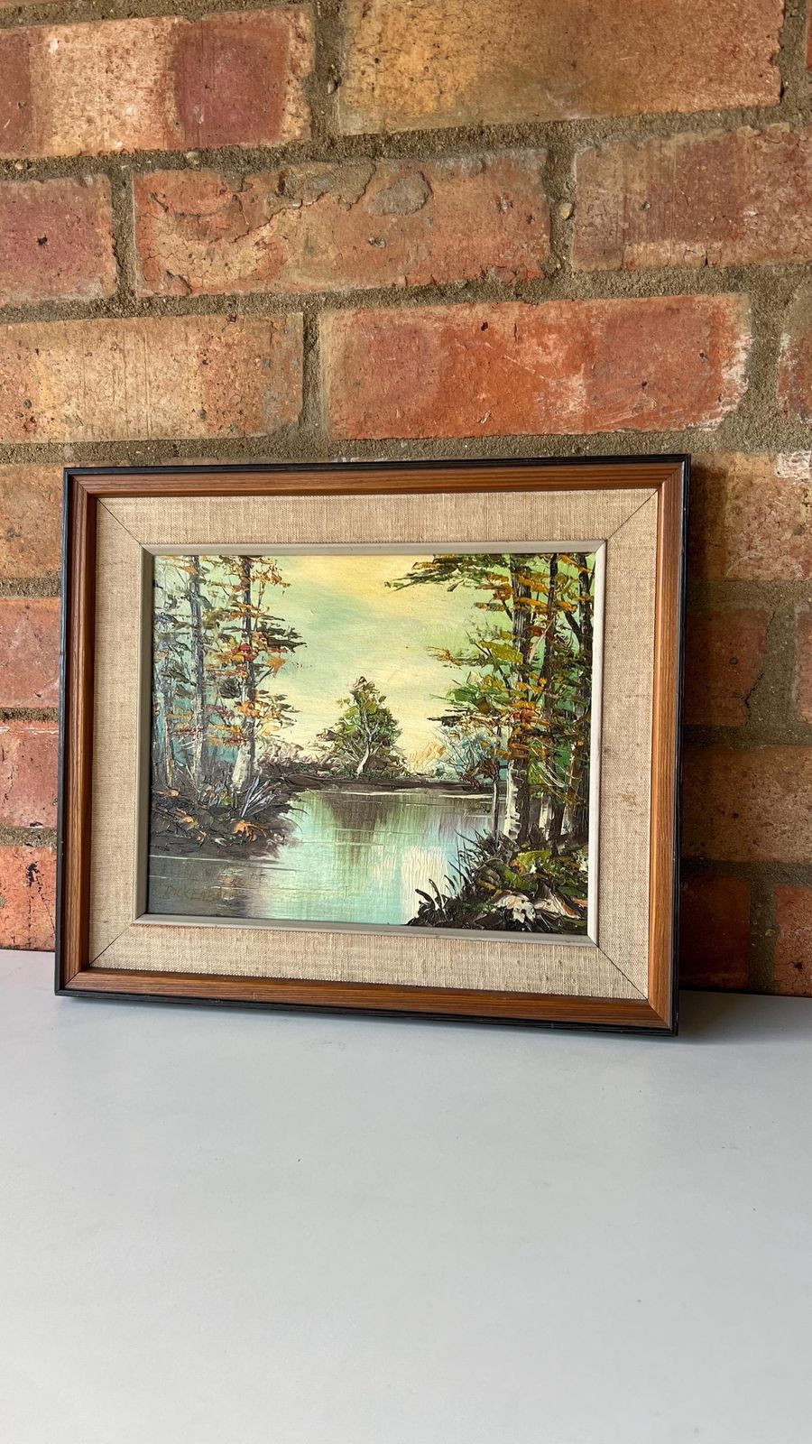 photo furniture Mid Century Oil Painting By Rickenbach – Tranquil River Landscape, Framed