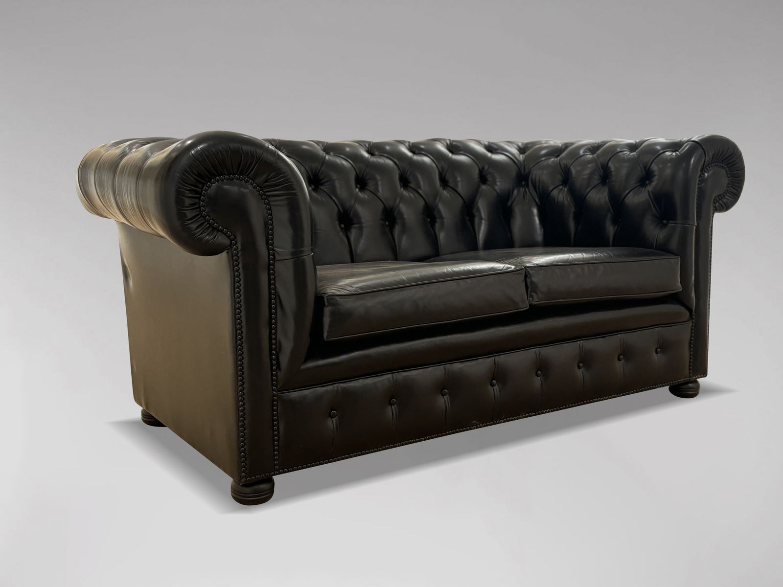 Black Leather 2 Seater Chesterfield Sofa photo 1900.0