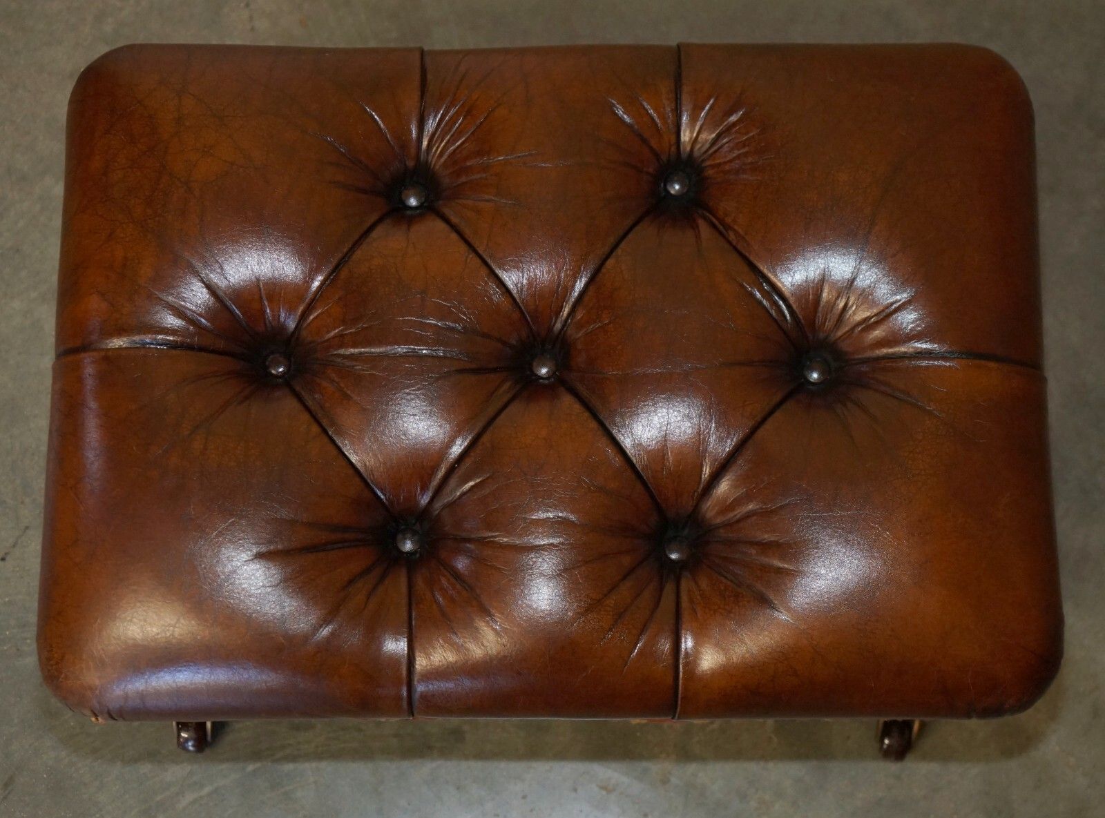 photo buy Pair Of Restored Brown Leather Chesterfield Tufted Porcelain Castors Footstools