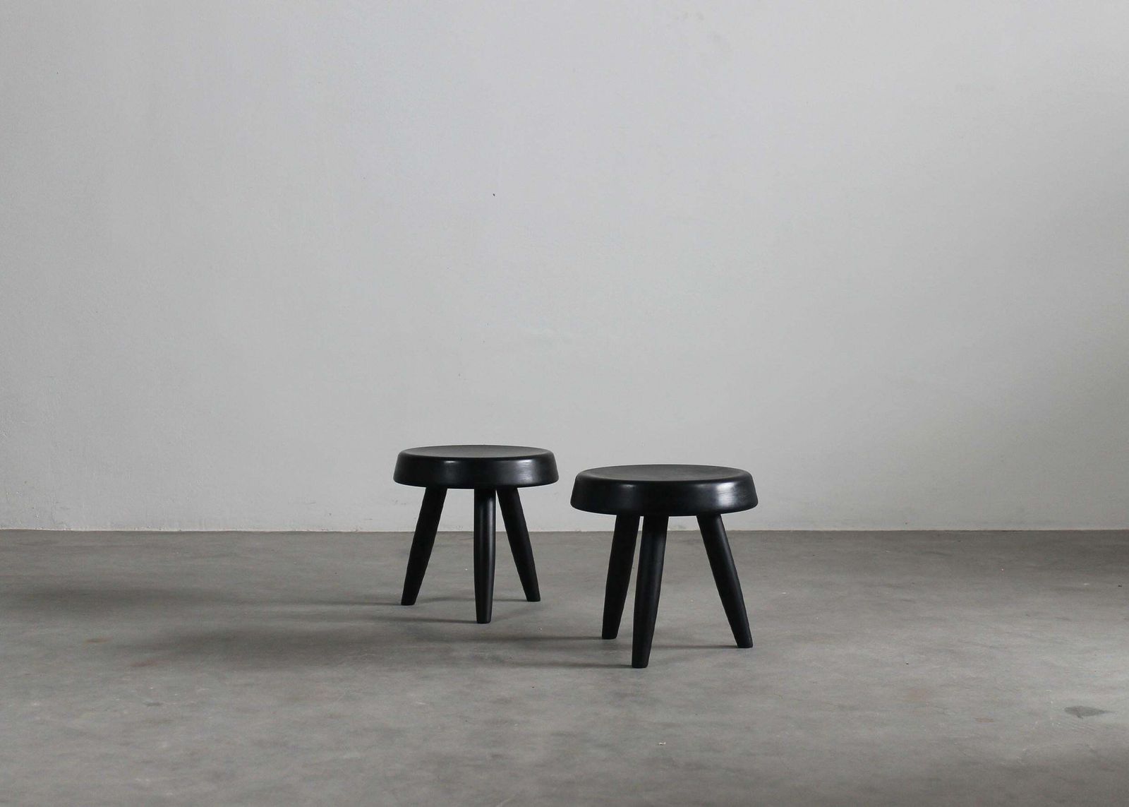Charlotte Perriand Set Of Two Black Stools In Wood 1950s photo furniture