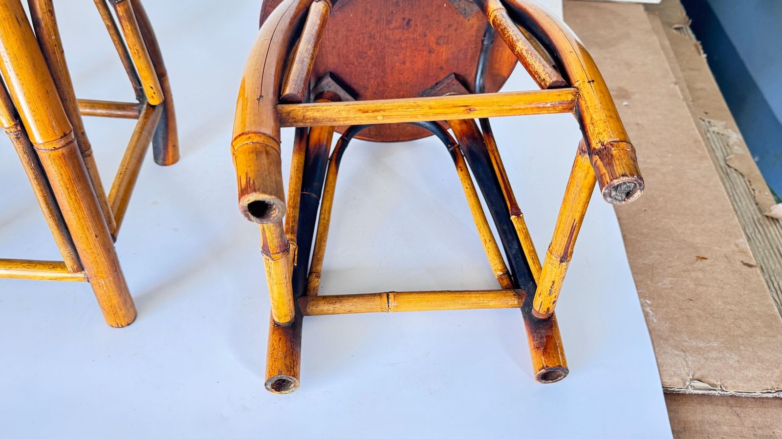 photo furniture Pair Of 1950s French Riviera Stools, Woven Rattan And Bamboo, Vibrant Geometric