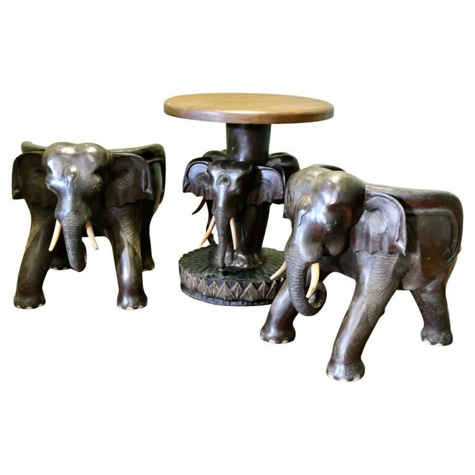 A Very Unusual Set Of Elephant Chairs And Table