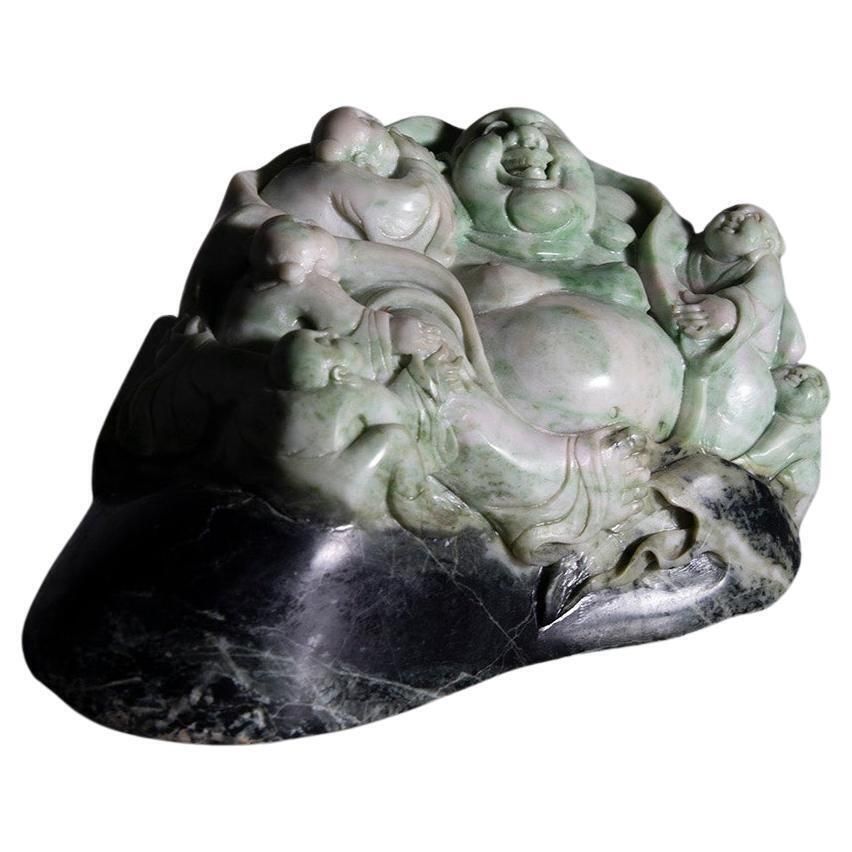Sculpture Of Buddha Surrounded By Children In Jade Root