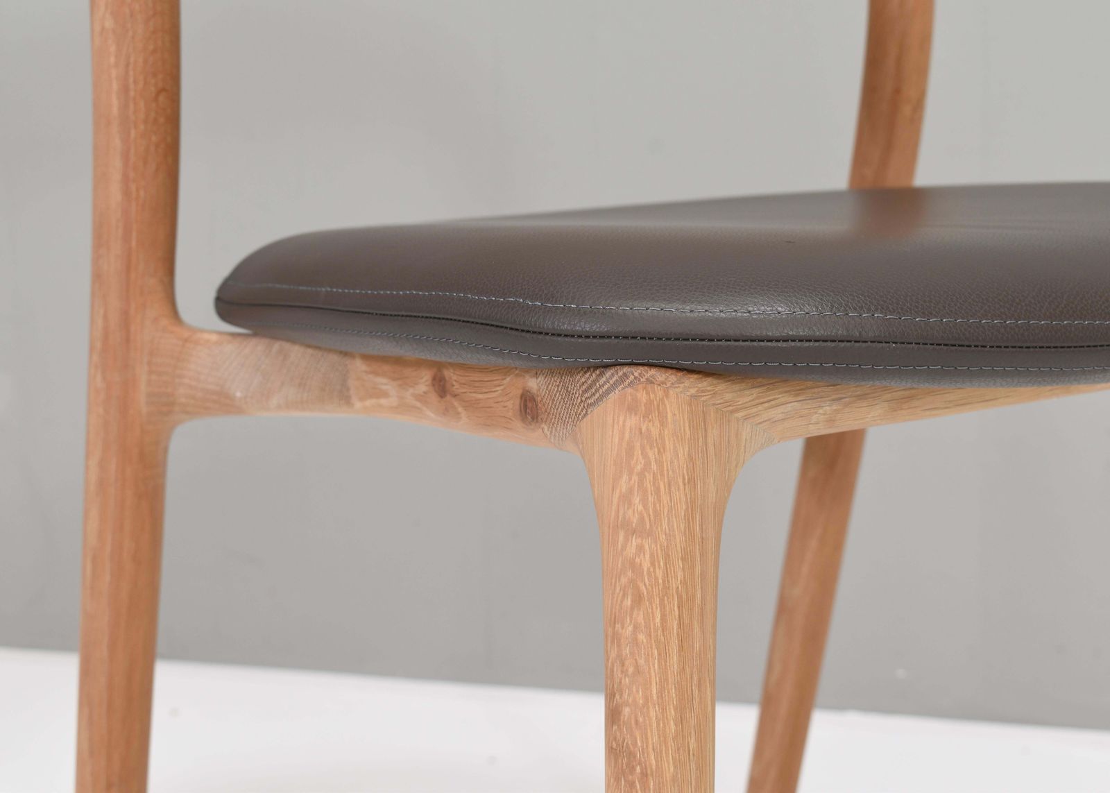 photo furniture Artisan Neva Light Chair In Oak And Leather, Bosnia.