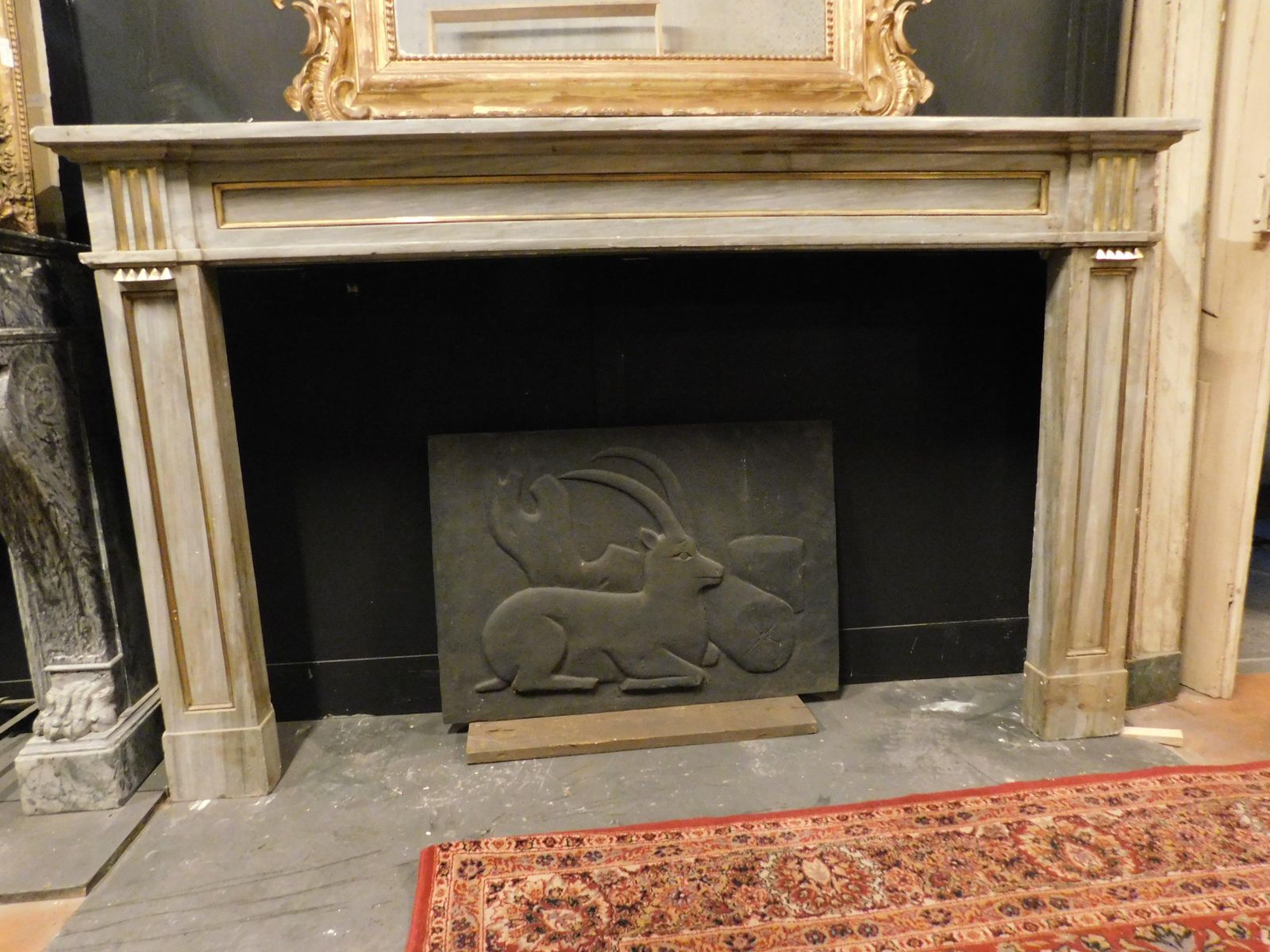 Louis XVI Fireplace Mantel In Grey Marble With Gold Trim, Italy photo for sale