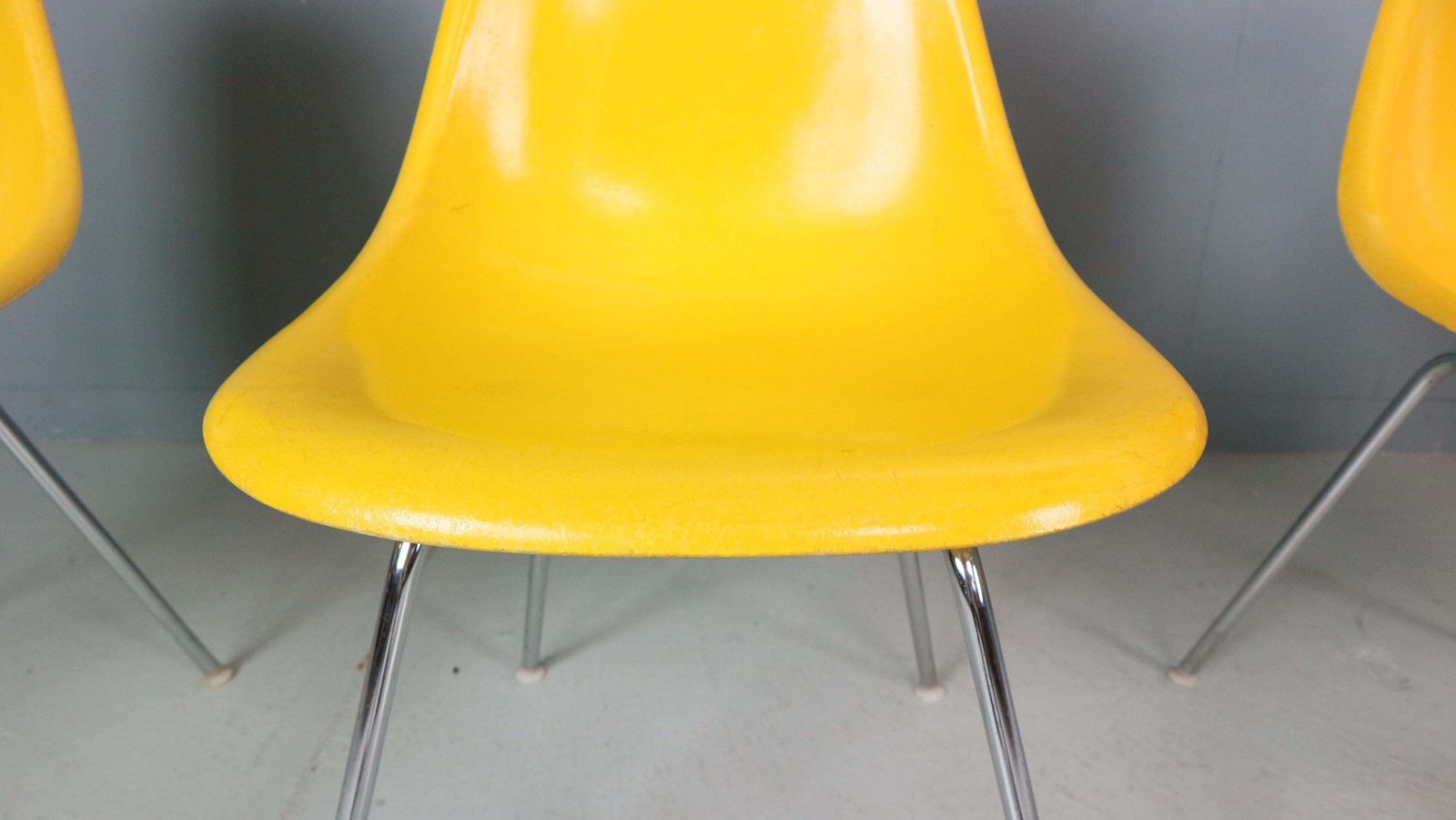 photo furniture Charles & Ray Eames Set Of 4 Yellow "H Base" Chairs For Herman Miller, 1960