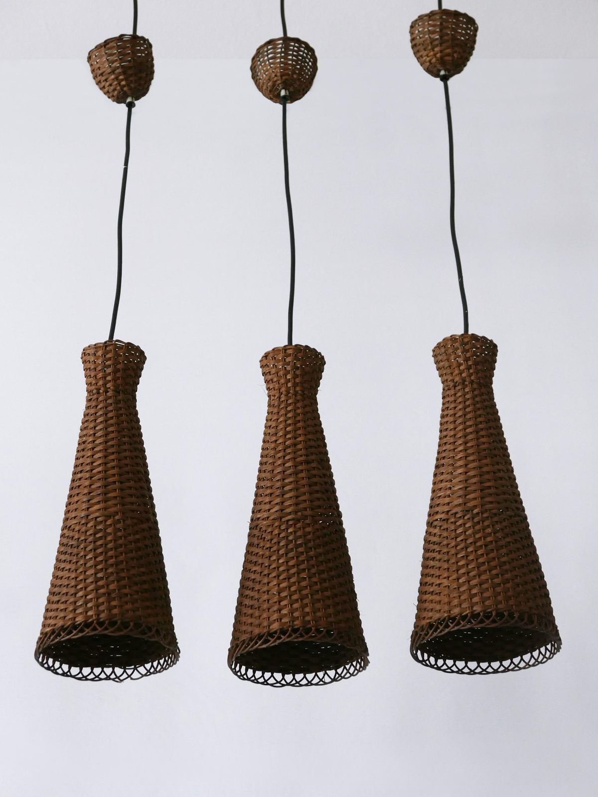 Lighting Set Of Three Lovely Mid Century Modern Rattan Diabolo Pendant Lamps 1960s photo